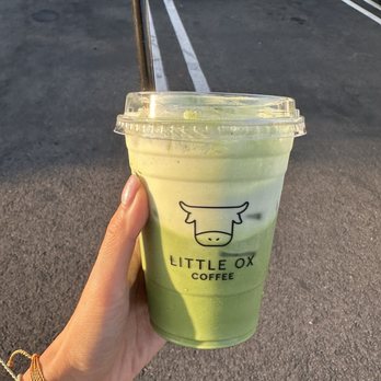 Little Ox Coffee - Matcha water with foam started to mix in, outdoor lighting - Coffee & Tea Near Me - Fullerton, California