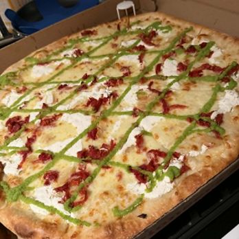 Two Boots Park Slope - Night Tripper: Sun-dried tomatoes, roasted garlic & jalapeño pesto on a white pie - Pizza Near Me - Brooklyn, New York Two Boots Park Slope - Night Tripper: Sun-dried tomatoes, roasted garlic & jalapeño pesto on a white pie - Pizza Near Me - Brooklyn, New York