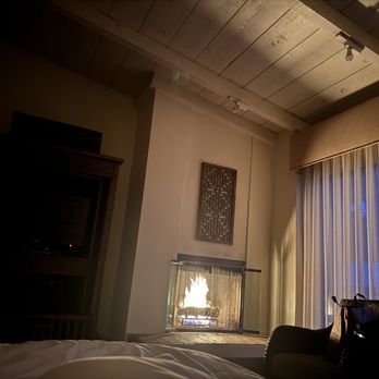 Tradewinds Carmel - Night time ambiance and fireplace in the room. - Hotels Near Me - Carmel, California