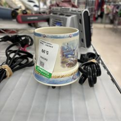 Goodwill Store & Donation Center - Here is an extremely small candle warmer. It's worth maybe 2.99 but definitely not 5.99