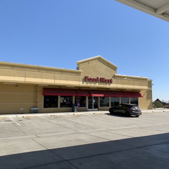 Shell - the outside of a food mart with a car parked in front of it - Gas Stations Near Me - Kettleman City, California