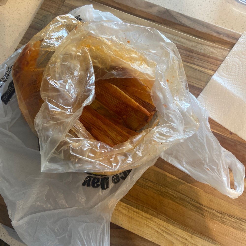 The Tamale Lady - a tamale wrapped in plastic - Mexican Near Me - Chicago, Illinois The Tamale Lady - a tamale wrapped in plastic - Mexican Near Me - Chicago, Illinois