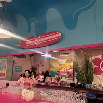 Malibu Barbie Cafe - a woman at the bar - Themed Cafes Near Me - Miami, Florida