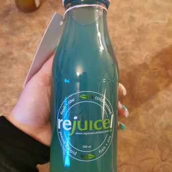 Rejuice Nutrition - a person holding a bottle of rejuice - Juice Bars & Smoothies Near Me - Montreal, Quebec Rejuice Nutrition - a person holding a bottle of rejuice - Juice Bars & Smoothies Near Me - Montreal, Quebec