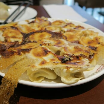 Qing Hua Dumpling - Pan Fried Dumpling - Chinese Near Me - Montreal, Quebec Qing Hua Dumpling - Pan Fried Dumpling - Chinese Near Me - Montreal, Quebec