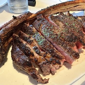 Fleming’s Prime Steakhouse & Wine Bar - 35oz Prime Tomahawk To Share - Steakhouses Near Me - Mclean, Virginia Fleming’s Prime Steakhouse & Wine Bar - 35oz Prime Tomahawk To Share - Steakhouses Near Me - Mclean, Virginia