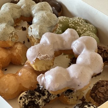 Peony - Black Sesame, Taro, Chocolate, Churro, Glazed, Banana, Cookies & Cream, & Green Tea Matcha mochi donuts - Coffee & Tea Near Me - Las Vegas, Nevada Peony - Black Sesame, Taro, Chocolate, Churro, Glazed, Banana, Cookies & Cream, & Green Tea Matcha mochi donuts - Coffee & Tea Near Me - Las Vegas, Nevada