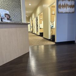 MINT dentistry | Cypress - Hallway with individual rooms