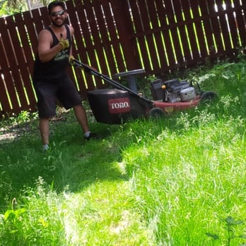 The Lawnfather - a man mowing the grass - Snow Removal Near Me - Calgary, Alberta The Lawnfather - a man mowing the grass - Snow Removal Near Me - Calgary, Alberta