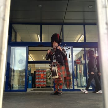 Lidl - A piper to celebrate the opening... - Grocery Near Me - Glasgow, GLG