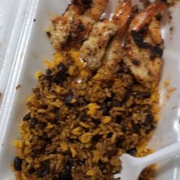 Grilled garlic shrimp, yellow rice and black beans after we tore into this omg delicious! $14 totally worth it Grilled garlic shrimp, yellow rice and black beans after we tore into this omg delicious! $14 totally worth it