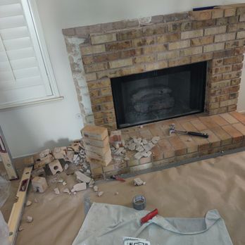 Renovo Remodeling - Fireplace facelift by Eddie the master tile man. - General Contractors Near Me