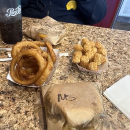 Mushroom Swiss burger and onion rings Mushroom Swiss burger and onion rings