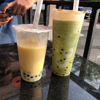 Coco Fresh Tea & Juice - Left: mango smoothie with boba Right: matcha smoothie with boba - Bubble Tea Near Me - Flushing, New York Coco Fresh Tea & Juice - Left: mango smoothie with boba Right: matcha smoothie with boba - Bubble Tea Near Me - Flushing, New York