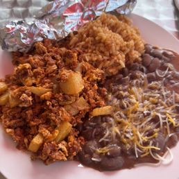 This was the Chorizo (con papa y huevos) (potato & eggs) side of rice & beans. This was the Chorizo (con papa y huevos) (potato & eggs) side of rice & beans.