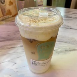 Black tea latte with cheese foam.