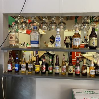Fiesta Mexican Restaurant - a shelf full of alcohol bottles - Mexican Near Me - Jackson, Wyoming