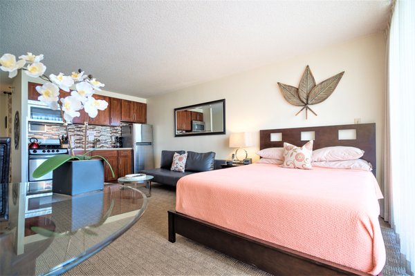 Premium Palm Studio #1702 - Waikiki Place LLC’s spacious studios are located in The Marine Surf Waikiki. It is in the heart of Waikiki, a block away from the Royal Hawaiian Hotel and just minutes to the beach. Be right in the center of the action in beautiful Waikiki. Walk to beach, free Hula shows and the lively nightlife on Kalakaua Ave. Shopping and restaurants are at your doorstep.
Enjoy sitting on your own private lanai and the warm tropical air or inside the comfort of your clean, air conditioned unit listening to Hawaiian music on your stereo system, watch a movie on the cable TV provided or surf the net on the broadband internet service provided. Cook a delicious meal in the full kitchen and dining area provided or go out to eat at the dozens of great restaurants within a block of your apartment.
Want more action? Walk down to Waikiki beach or Kapiolani Park for surfing, swimming or jogging. Take the bus (bus stop adjacent to unit) to any location on the island!!! (Hanauma Bay, Pearl Harbor, North Shore or Diamond Head Crater to name just a few)
Our studios are a great alternative to hotels and most vacation rentals and give you a lot more "bang for your buck". All of our studios include:
• FULL kitchens complete with range, oven, microwave, full size refrigerators and are fully stocked (utensils, pots/pans, plates, glasses, silverware and even a starter supply of paper goods and coffee!)
• Free covered and assigned parking
• Deluxe Queen-sized bed PLUS full size sofa bed, comfortably sleeps 4
• Free phone service (US and Canada)
• Free Wi-Fi internet access
• Large Flat Screen Cable TV with DVD player
• Updated baths with “rainfall” showers
• Air-conditioning for your comfort - or take advantage of our tropical breezes!
• Amenities include a newly renovated and secured Lobby as well as pool and sundeck
• Laundry facilities on each floor for your convenience Premium Palm Studio #1702 - Waikiki Place LLC’s spacious studios are located in The Marine Surf Waikiki. It is in the heart of Waikiki, a block away from the Royal Hawaiian Hotel and just minutes to the beach. Be right in the center of the action in beautiful Waikiki. Walk to beach, free Hula shows and the lively nightlife on Kalakaua Ave. Shopping and restaurants are at your doorstep.
Enjoy sitting on your own private lanai and the warm tropical air or inside the comfort of your clean, air conditioned unit listening to Hawaiian music on your stereo system, watch a movie on the cable TV provided or surf the net on the broadband internet service provided. Cook a delicious meal in the full kitchen and dining area provided or go out to eat at the dozens of great restaurants within a block of your apartment.
Want more action? Walk down to Waikiki beach or Kapiolani Park for surfing, swimming or jogging. Take the bus (bus stop adjacent to unit) to any location on the island!!! (Hanauma Bay, Pearl Harbor, North Shore or Diamond Head Crater to name just a few)
Our studios are a great alternative to hotels and most vacation rentals and give you a lot more "bang for your buck". All of our studios include:
• FULL kitchens complete with range, oven, microwave, full size refrigerators and are fully stocked (utensils, pots/pans, plates, glasses, silverware and even a starter supply of paper goods and coffee!)
• Free covered and assigned parking
• Deluxe Queen-sized bed PLUS full size sofa bed, comfortably sleeps 4
• Free phone service (US and Canada)
• Free Wi-Fi internet access
• Large Flat Screen Cable TV with DVD player
• Updated baths with “rainfall” showers
• Air-conditioning for your comfort - or take advantage of our tropical breezes!
• Amenities include a newly renovated and secured Lobby as well as pool and sundeck
• Laundry facilities on each floor for your convenience
