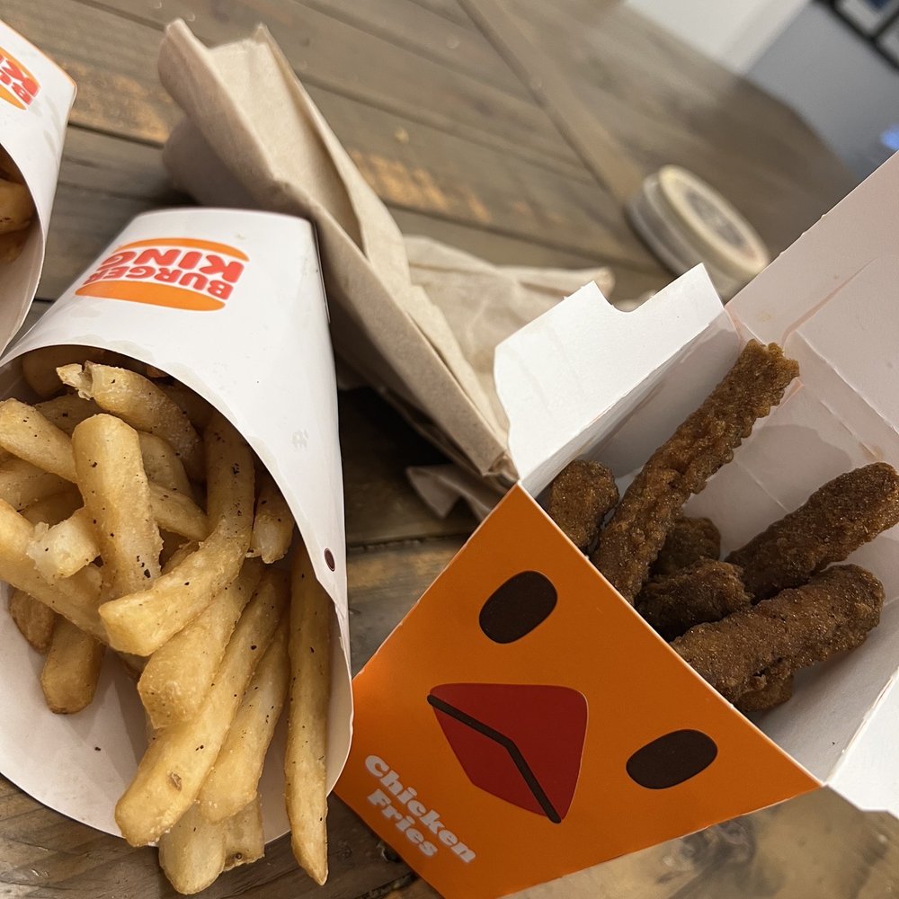 My chicken fries are black and sad. Fries have some weird black stuff on it. My chicken fries are black and sad. Fries have some weird black stuff on it.