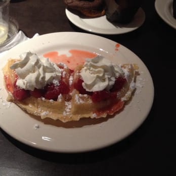 Pomeroy Inn & Suites - Waffles with powdered sugar, strawberries, and whipped cream. - Hotels Near Me - Olds, Alberta Pomeroy Inn & Suites - Waffles with powdered sugar, strawberries, and whipped cream. - Hotels Near Me - Olds, Alberta