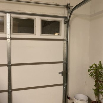 Garage Door Fixer - Interior rolling tracks - Garage Door Services Near Me - Little Rock, Arkansas