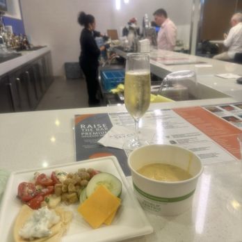 Delta Sky Club - Nice food selection and free sparkling is always good - Airport Lounges Near Me - Indianapolis, Indiana