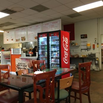 Brandon Donuts And Full Breakfast - a table and chairs - Donuts Near Me - Brandon, Mississippi