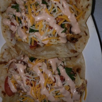 The Last Taino - two tacos on a plate - Caribbean Near Me - Wallace, North Carolina The Last Taino - two tacos on a plate - Caribbean Near Me - Wallace, North Carolina