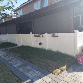 Bell Remodeling And Construction - Patio white fence enclosing my existing patio cover - Roofing Near Me - Palmdale, California