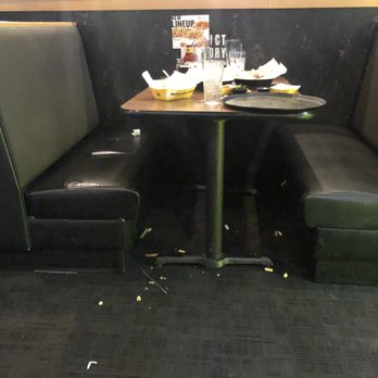 Buffalo Wild Wings - This is how the tables around us looked as we came in and 1 hour later when we left they never cleaned them and that was right next to us! - Chicken Wings Near Me - Folsom, California