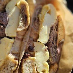 Don Guerra's Barrio Bagel & Slice - Breakfast: cinnamon raisin bagel with egg cheese and a grass raised beef slider