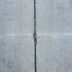 J & D Disposal - Cracked at the seam from the dumpster wheels