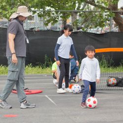 Euro School of Tennis - Our young soccer stars with Coach in action!