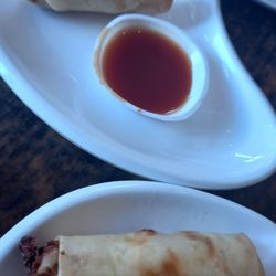 Angie's Dumpling Bar - Our entree.  Prawn not vegetarian.  Rolls. With a sweet and sour sauce for dipping. Crunchy and interesting.
