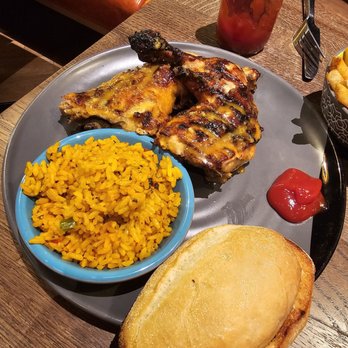 Nando's Peri-Peri - Two 1/4 Chicken legs (Mango & lime) with rice and garlic bread - Chicken Shop Near Me - Virginia Beach, Virginia Nando's Peri-Peri - Two 1/4 Chicken legs (Mango & lime) with rice and garlic bread - Chicken Shop Near Me - Virginia Beach, Virginia