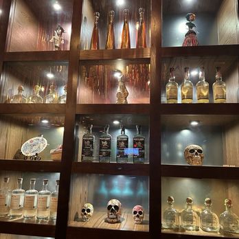 Dos Caminos - Tequila wall - Mexican Near Me - Charlotte, North Carolina Dos Caminos - Tequila wall - Mexican Near Me - Charlotte, North Carolina