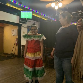 Pupuseria Katarina - Katarina (in celebratory El Salvadororen dress) and Mother - Salvadoran Near Me - Cleveland, Ohio Pupuseria Katarina - Katarina (in celebratory El Salvadororen dress) and Mother - Salvadoran Near Me - Cleveland, Ohio