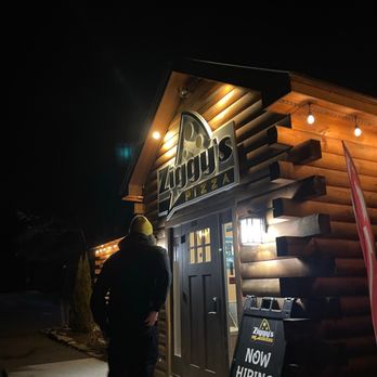 Ziggy's Pizza - a man standing in front of a restaurant - Pizza Near Me - Sunapee, New Hampshire Ziggy's Pizza - a man standing in front of a restaurant - Pizza Near Me - Sunapee, New Hampshire