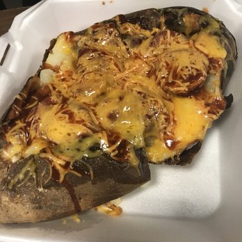 Dos Mundos - The #3 this spud which is a large size in the picture has hot links with bbq sauces drizzled! - American Near Me - Bellmead, Texas Dos Mundos - The #3 this spud which is a large size in the picture has hot links with bbq sauces drizzled! - American Near Me - Bellmead, Texas