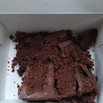 The Chocolate - thumbs down for 5+ dollars for a crumbly piece of cake that the guy basically threw into the box. I should have just made my own cake. - Desserts Near Me - Orem, Utah