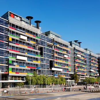 NAB Village - The modern and colourful NAB building at Docklands which is host to a branch and cafe as well as head office for NAB staff - Shared Office Spaces Near Me - Docklands, VIC