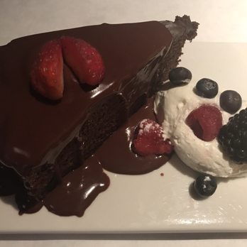 Owen's Bistro - Dark chocolate cake was moist and tasted heavenly - New American Near Me - Chino, California Owen's Bistro - Dark chocolate cake was moist and tasted heavenly - New American Near Me - Chino, California
