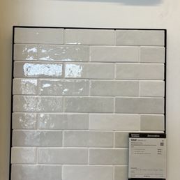 Store sample has gray, light gray, very little white and taupe.