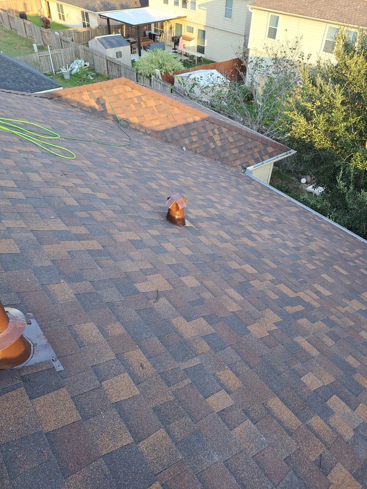 Slide of Truly Roofing & Construction