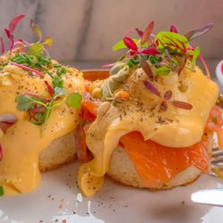 Shoreditch Grind - Smoked salmon on the house crumpets, poached eggs, hollandaise and fresh sprouts