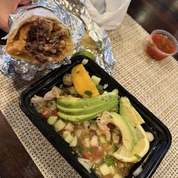 Burrito Regular with carnitas and cabeza (no cheese or sour cream) Tostada Ceviche de Camaron comes with chips and 2 tostadas Burrito Regular with carnitas and cabeza (no cheese or sour cream) Tostada Ceviche de Camaron comes with chips and 2 tostadas