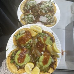 Taqueria los tres Garcia's - Asada tacos (top) Pastor tacos (bottom) Each taco comes with two tortillas.