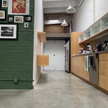 Beyond Green Construction - BEFORE: kitchen with small loft above, no stairs - General Contractors Near Me