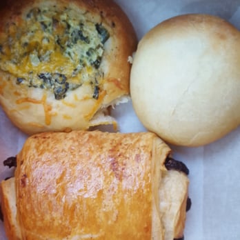 Red Dessert Dive - Spinach, artichoke, and chive kolache(top left); signature kolache, and chocolate croissant. - Desserts Near Me - Houston, Texas Red Dessert Dive - Spinach, artichoke, and chive kolache(top left); signature kolache, and chocolate croissant. - Desserts Near Me - Houston, Texas