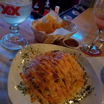 Tainos Cafe & Lounge - Nachos, chicken, cheese, plantains! Delicious! $12 - Latin American Near Me - Coram, New York Tainos Cafe & Lounge - Nachos, chicken, cheese, plantains! Delicious! $12 - Latin American Near Me - Coram, New York